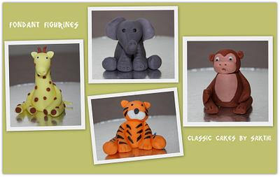 Fondant animal figurines - Cake by Classic Cakes by Sakthi