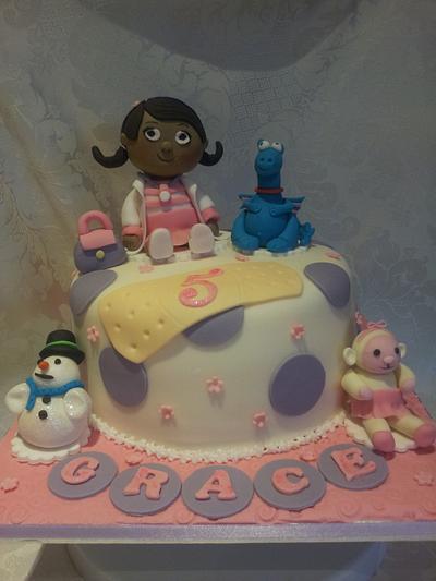 Doc mcstuffins - Cake by Sharonscakecreations