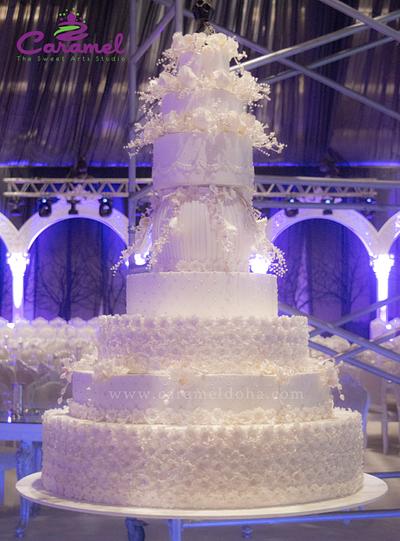 White Spring Orchids wedding cake - Cake by Caramel Doha