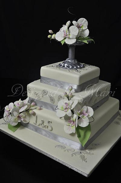 wedding cake with moth orchids - Cake by designed by mani