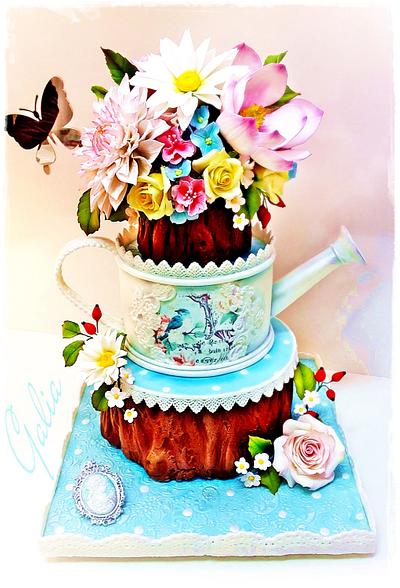 Watering can with flowers on a wooden stump - Cake by Galya's Art 