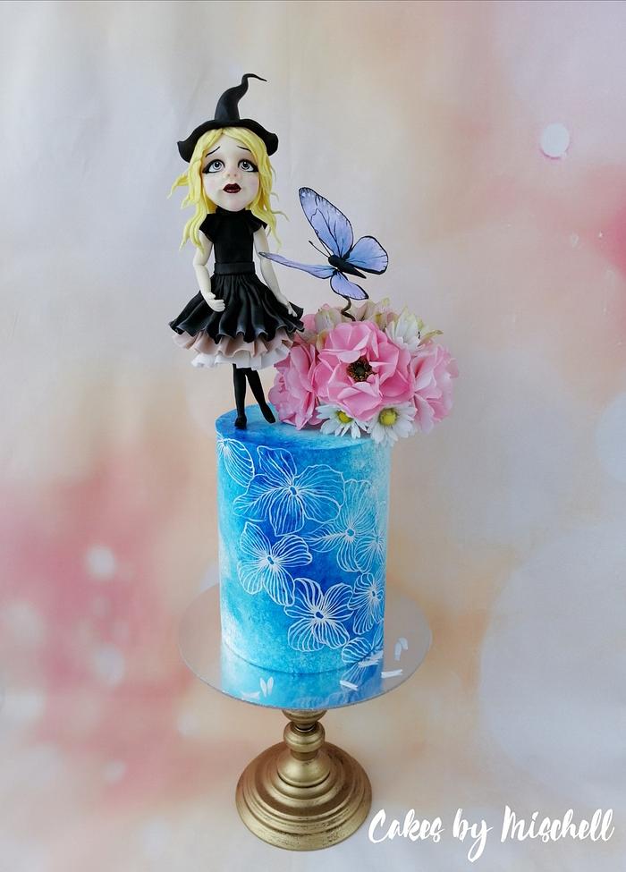 Flower cake with a witch