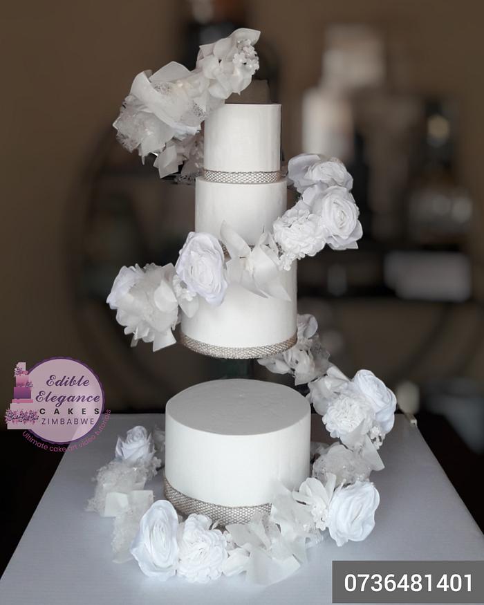 Floating cake with floating flowers cascade