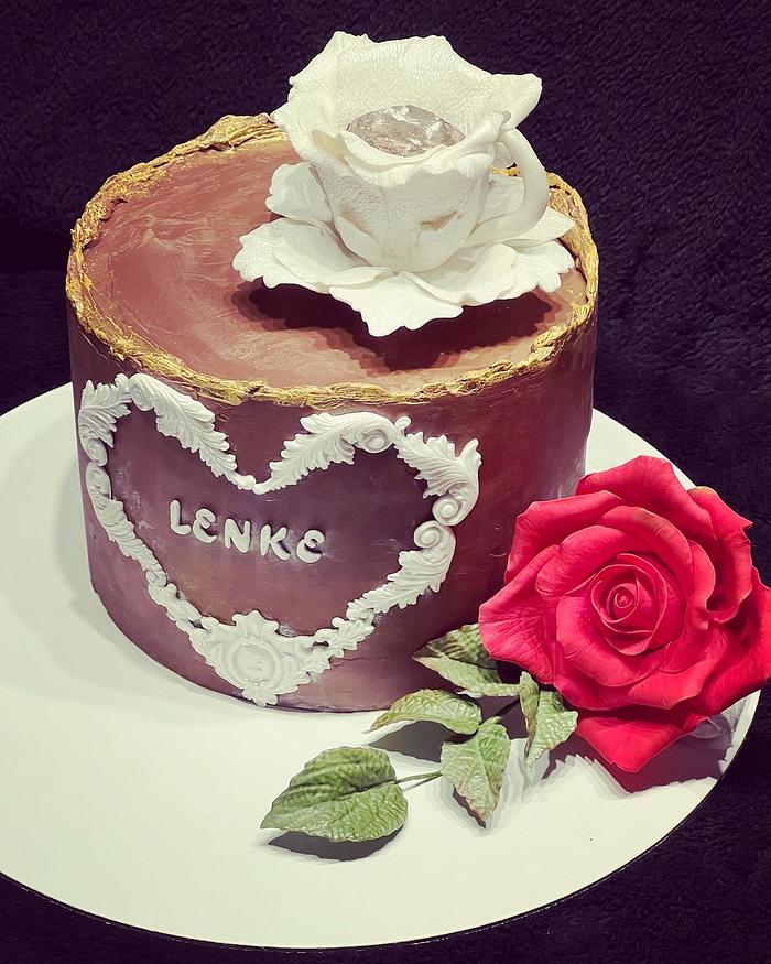 Snickers cake with fondant rose and cup