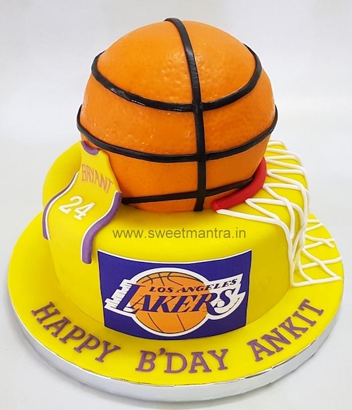 Basketball shaped customised birthday cake with Lakers - CakesDecor