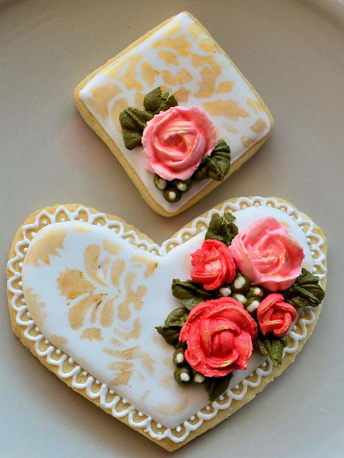 Heart with royal icing flowers and decoration.