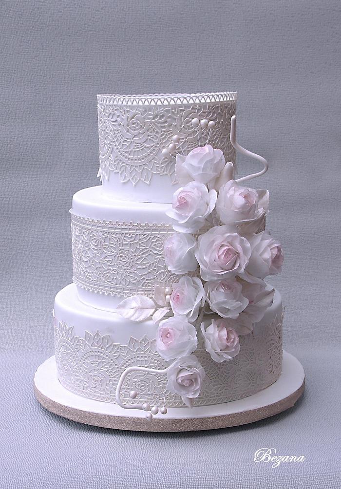 Wedding cake with flowers of edible paper
