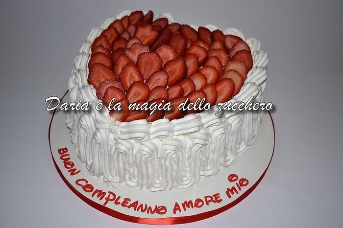 Cream and strawberry heart cake
