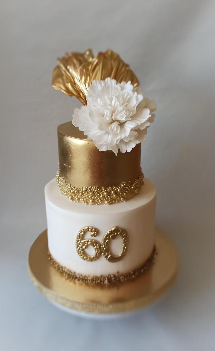 Gold and white birthday cake