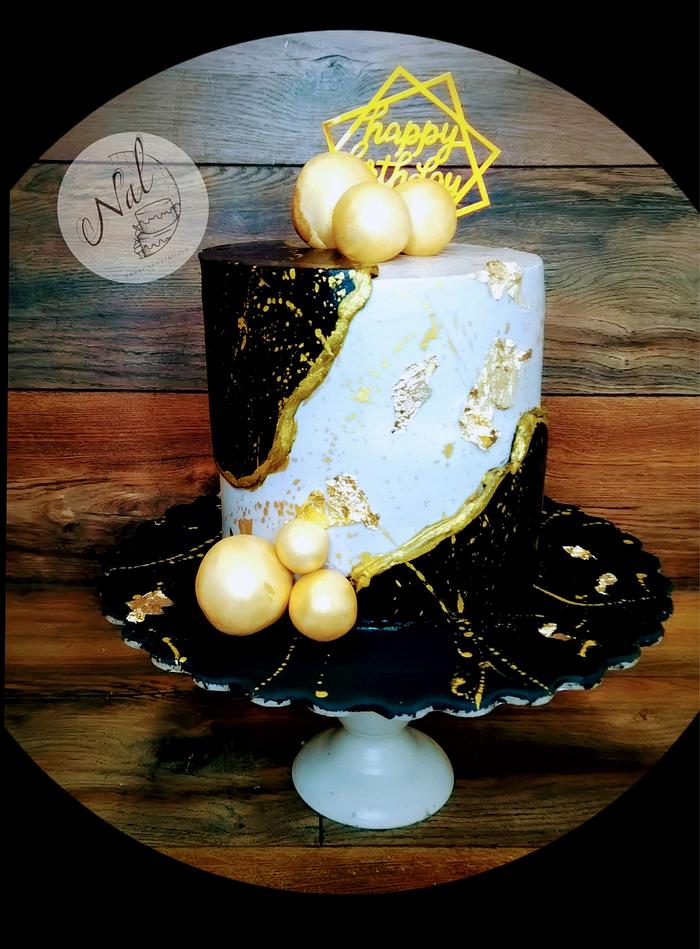 Black and gold cake