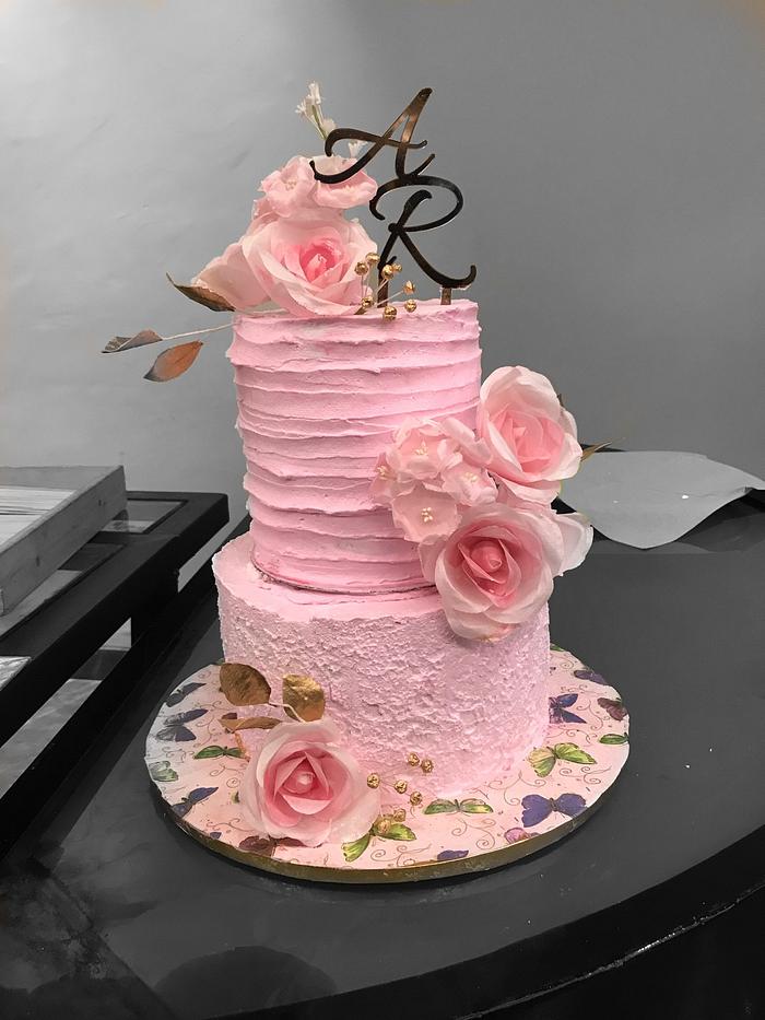 Wedding cake in whipped cream with wafer paper flowers 