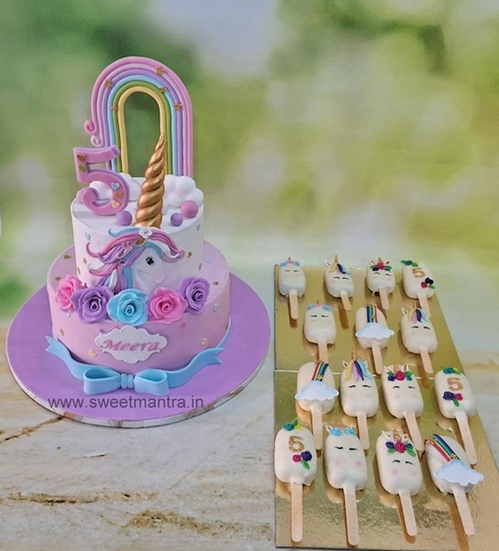 Unicorn theme cake and cakesicles