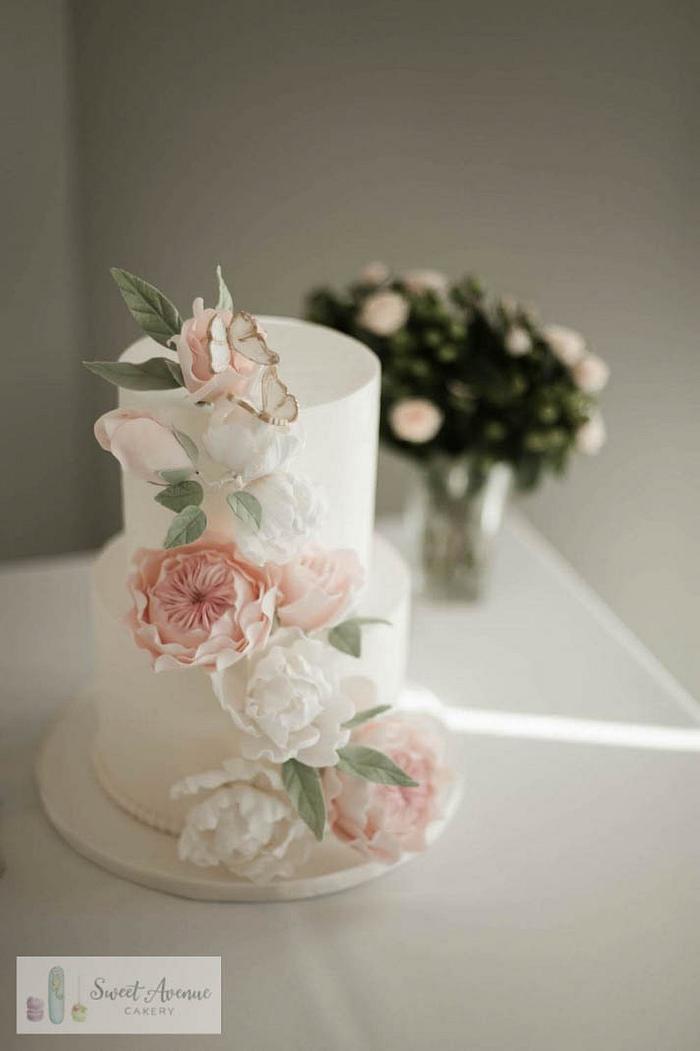 Romantic floral cascade wedding cake