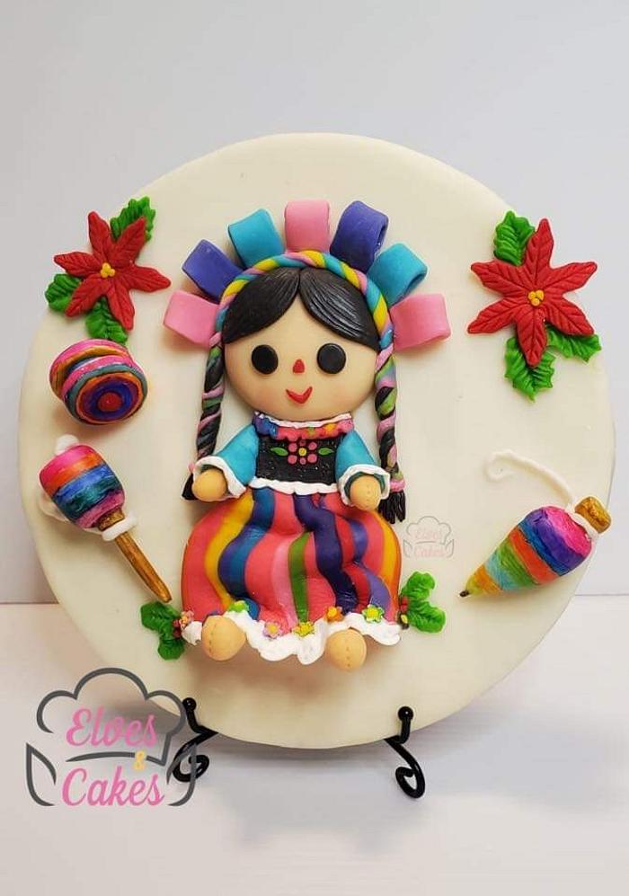 Muñeca de trapo mexicana - Decorated Cake by Loe Ortiz - CakesDecor
