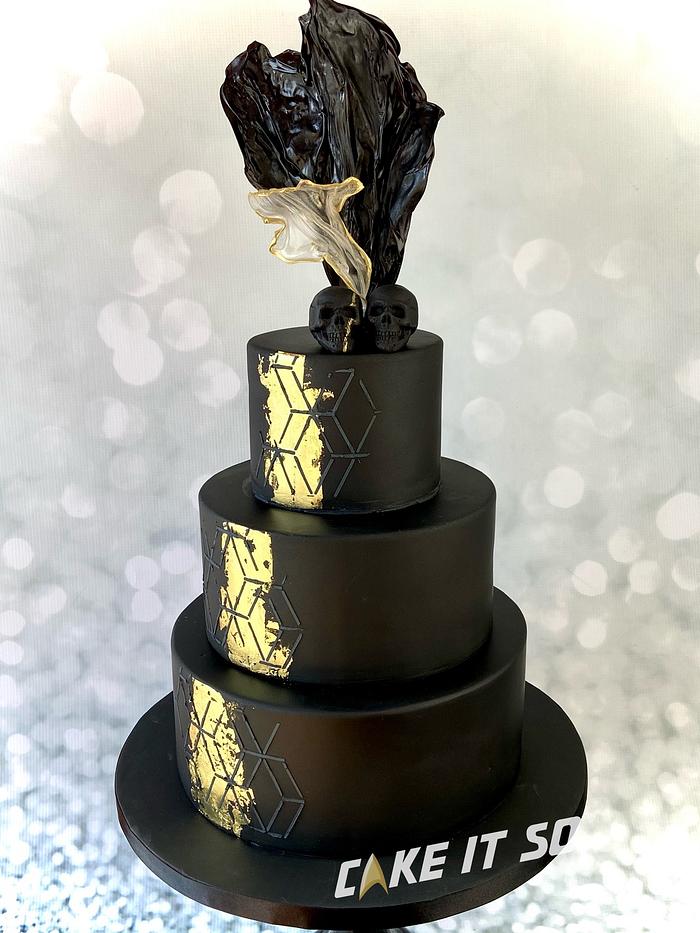 Black & gold, skull topped wedding cake