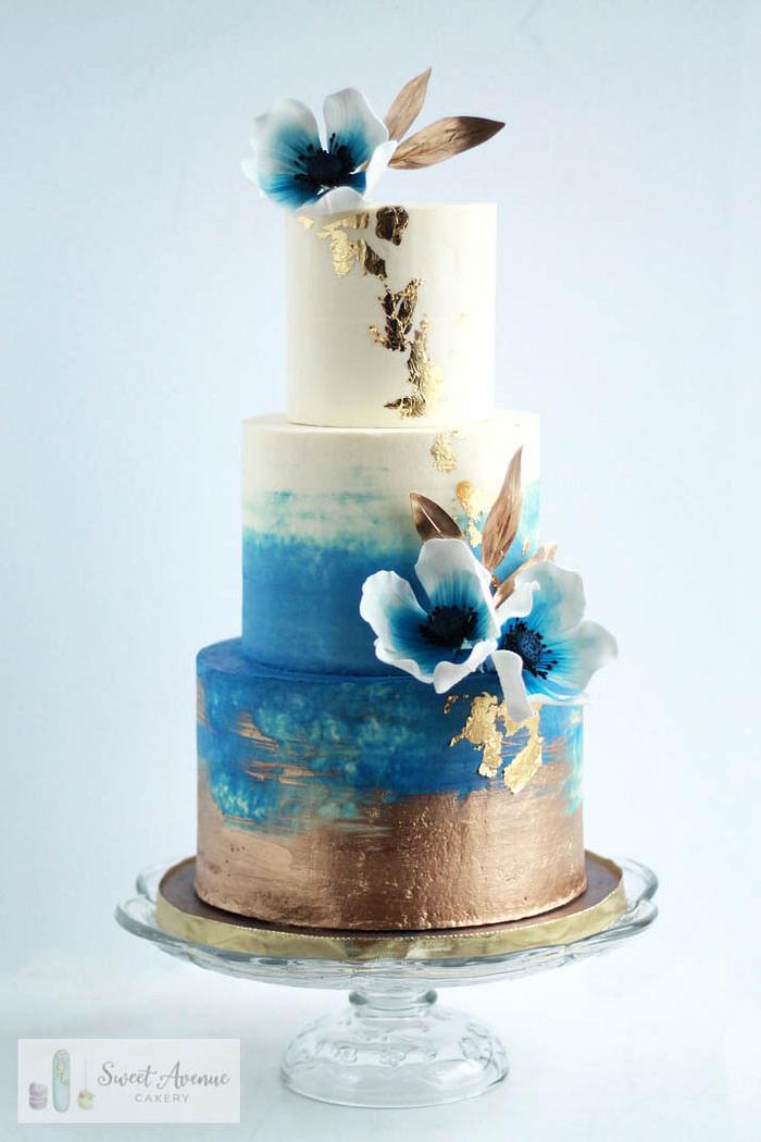 Navy blue and gold watercolour buttercream wedding cake 
