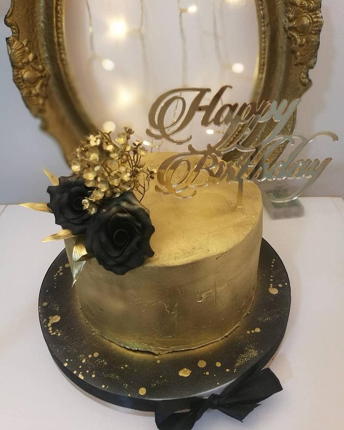 Gold black cake