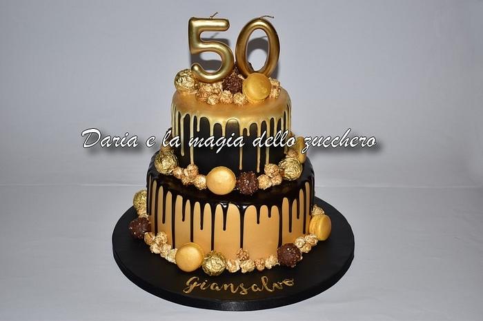 Black and gold drip cake