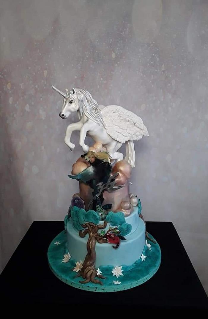 Rainbow Unicorn/Pegasus Birthday Cake! Everything is edible with the  exception of the bling wrap! It is also heavily dusted with edible glitter  for that extra pizazz! : r/CAKEWIN