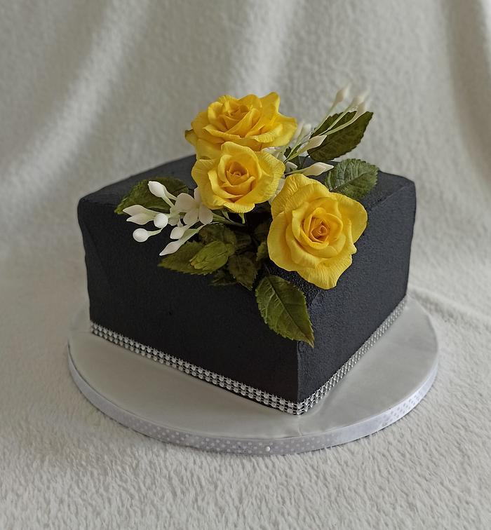 Black cake with roses