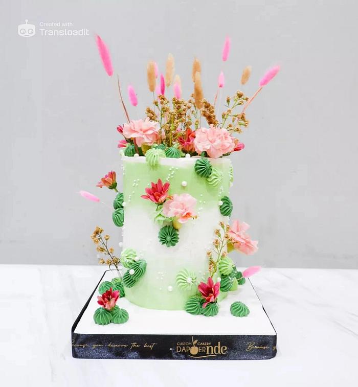 Abstract Birthday Cake with a Mix of Pink, Green, and White