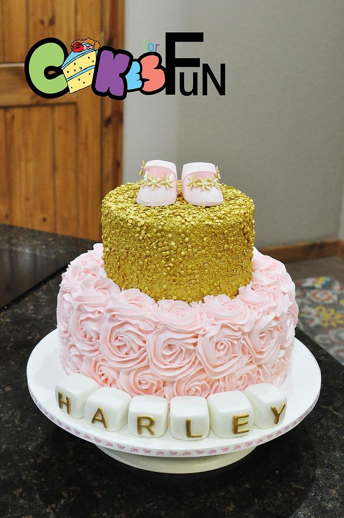 Pink and gold baby shower cake