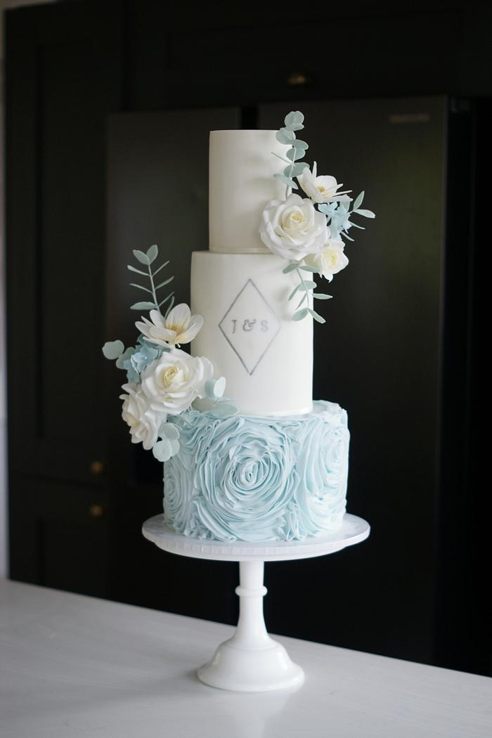 Blue rosette ruffles fondant wedding cake