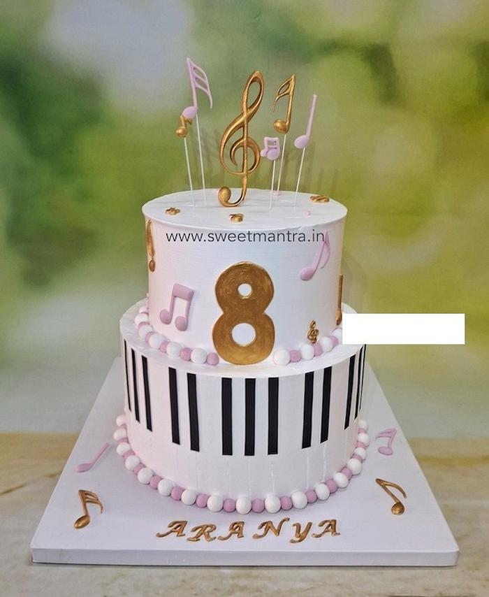 2 layer Music cake in whipped cream