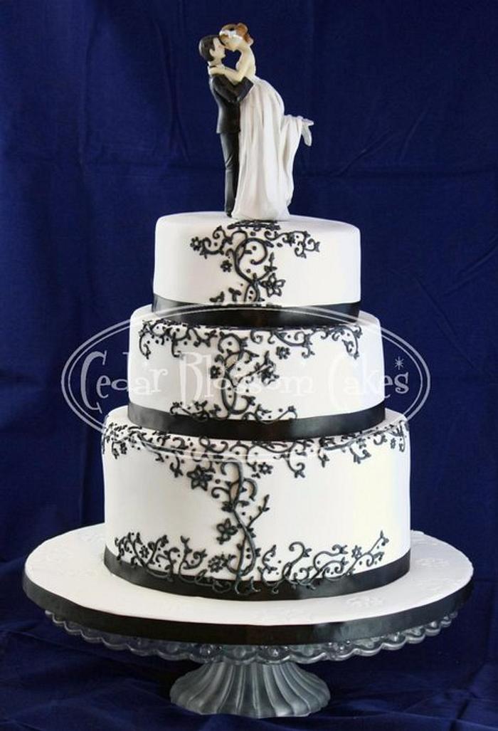 Black and white pressure piped wedding cake