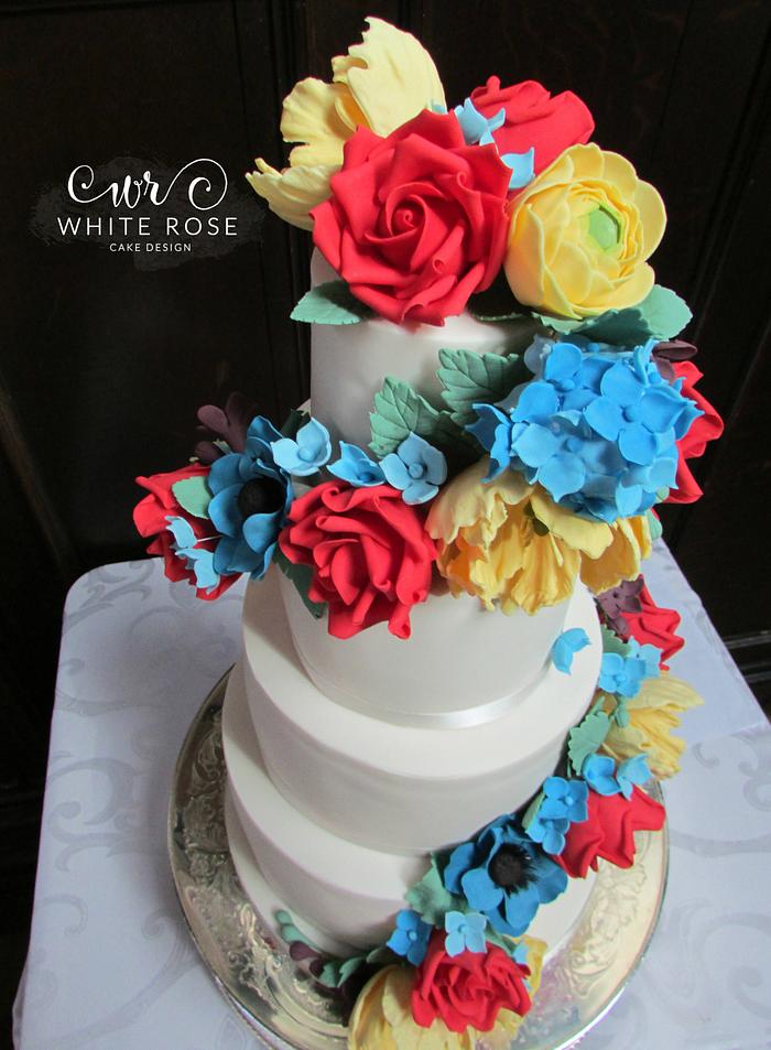 Brights Floral Cascade Wedding Cake for Superhero Themed Wedding :)