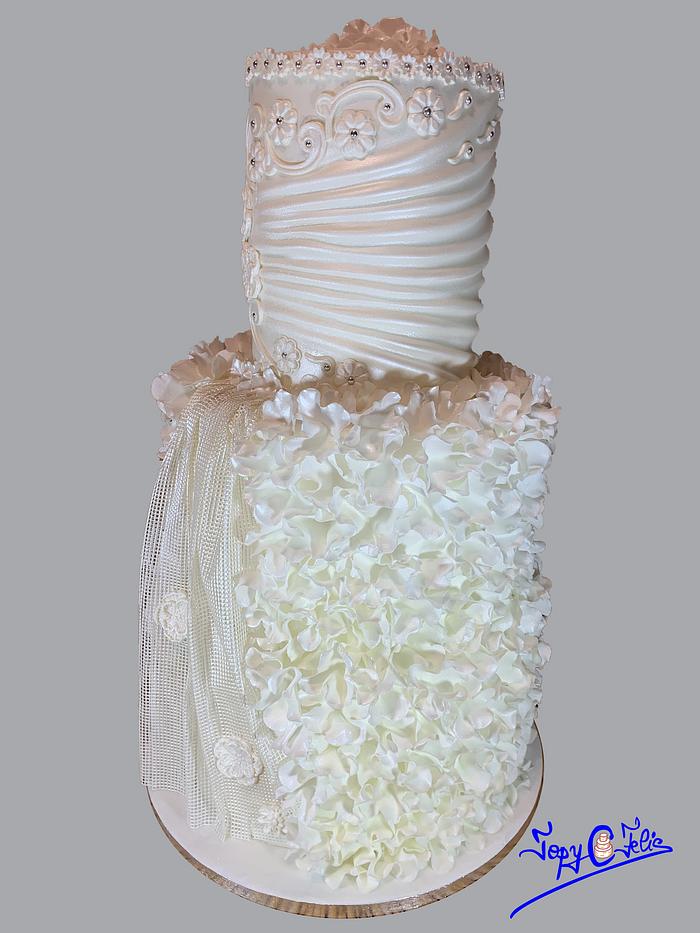 Pearl white wedding cake- Couture Cakers 2020