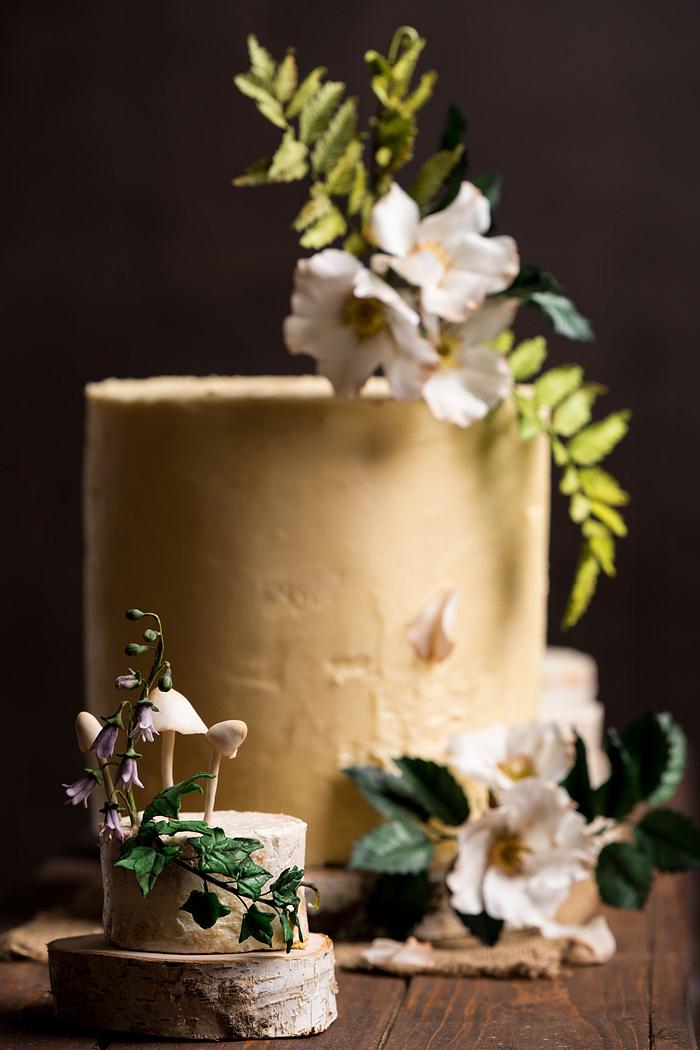 Rustic woodland cake with sugar flowers