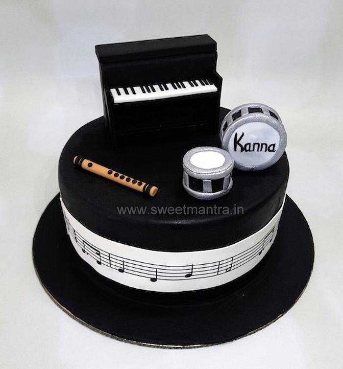 60th birthday cake designed on my own with a request to have indian musical  instruments image, black & gold colour 😊 Singnature rich… | Instagram