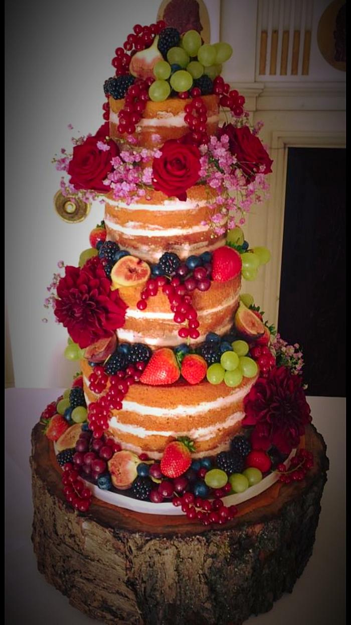 Berries and fresh flowers naked cake!