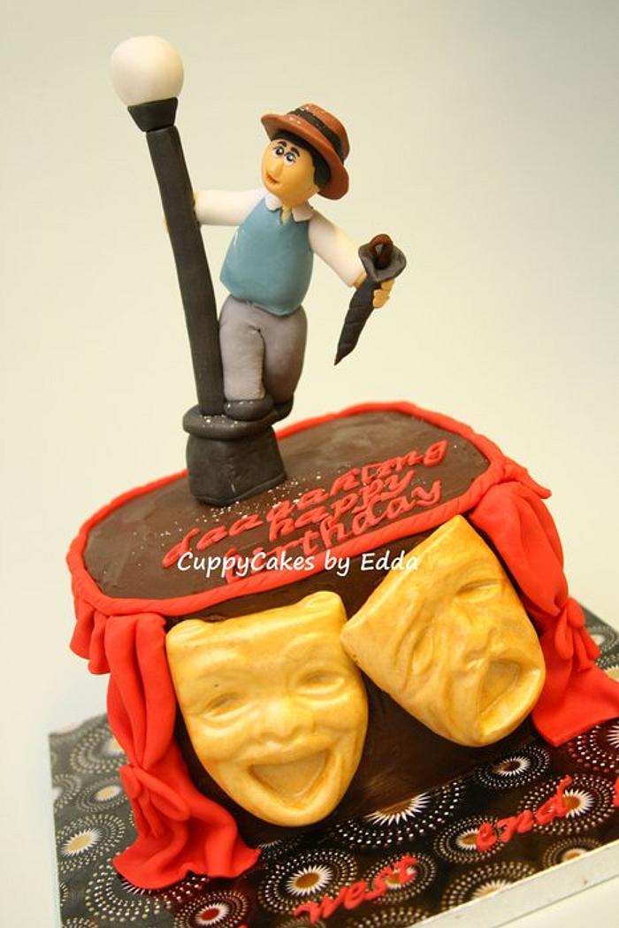 west end "singing in the rain" inspired cake