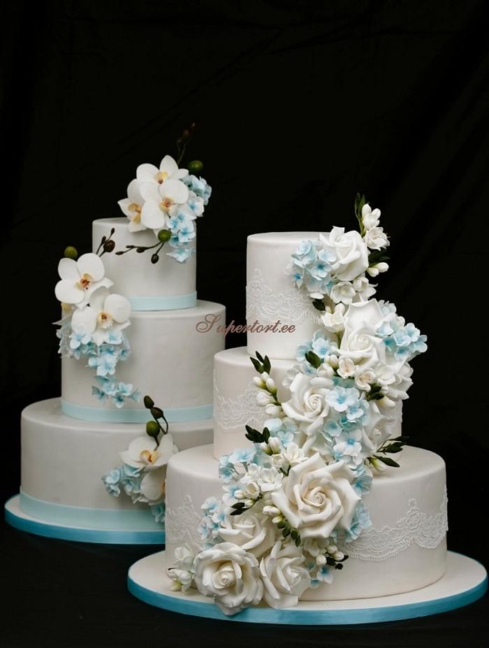 2 cakes with sky blue flowers