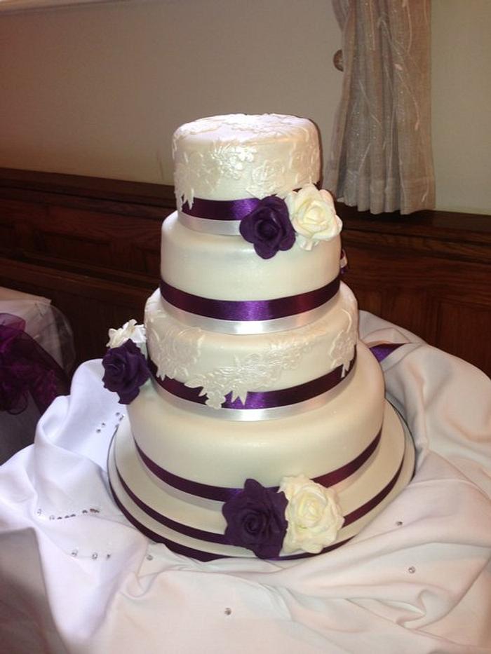 4 tier lace and roses wedding cake