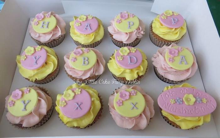 Pretty pink and yellow birthday cupcakes