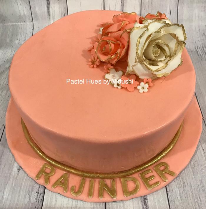 Peach and gold birthday cake