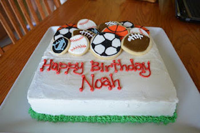 Sports theme birthday cake with cookie toppers