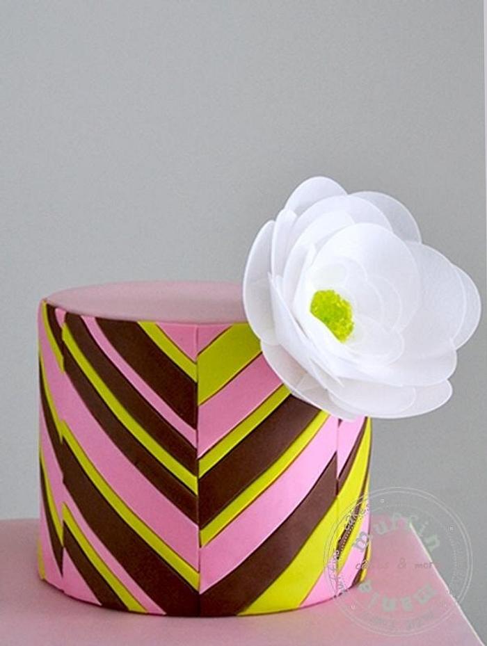 Chevron cake with wafer flower