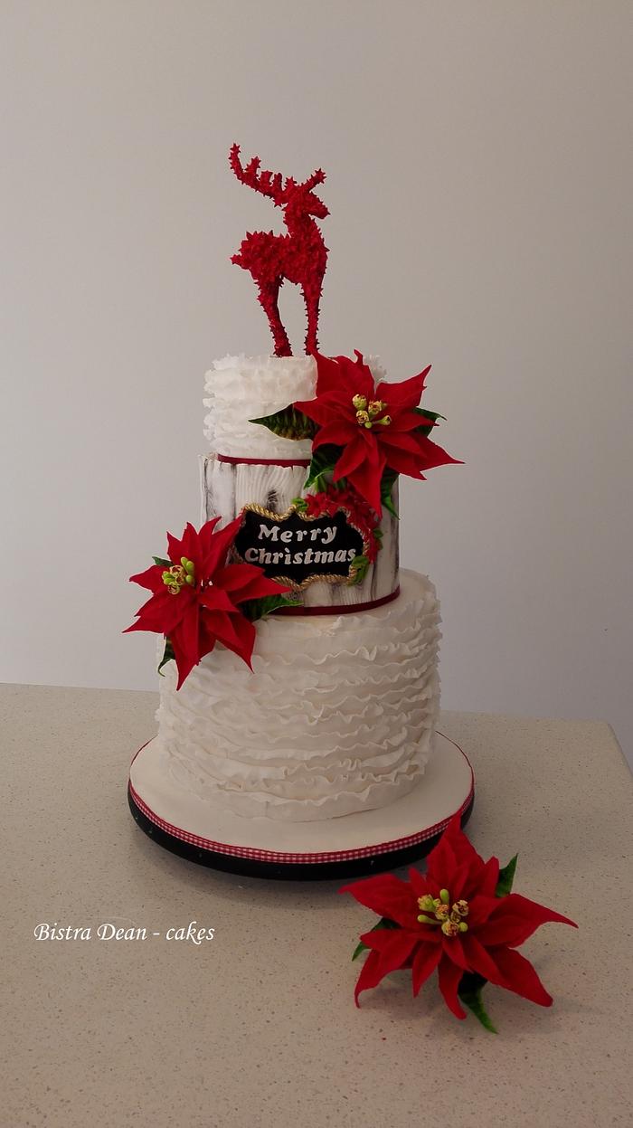 Christmas cake with poinsettias and a reindeer ... 