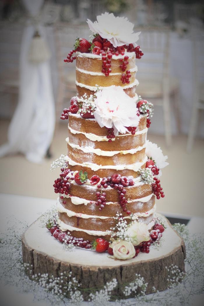 Naked wedding cake with peonies