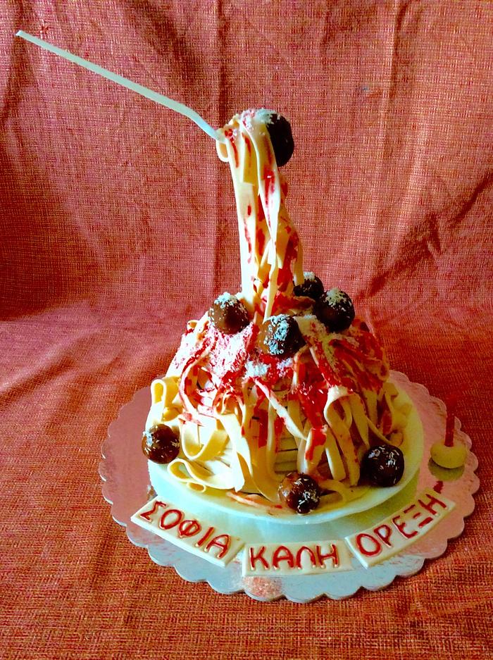 Spaghetti and meatballs cake
