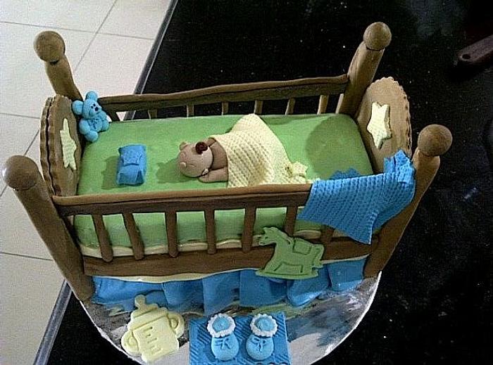 the baby in the crib cake