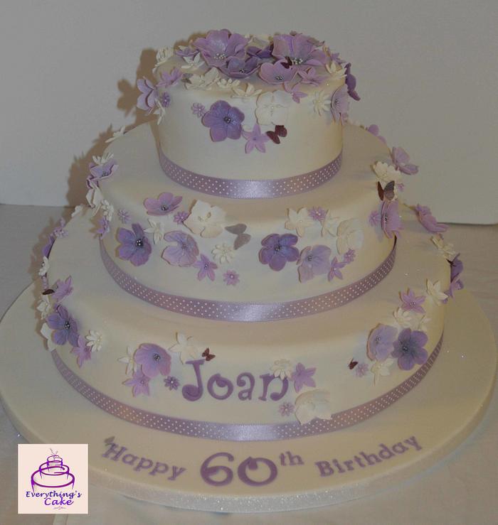 3 tier purple and lilac flowers