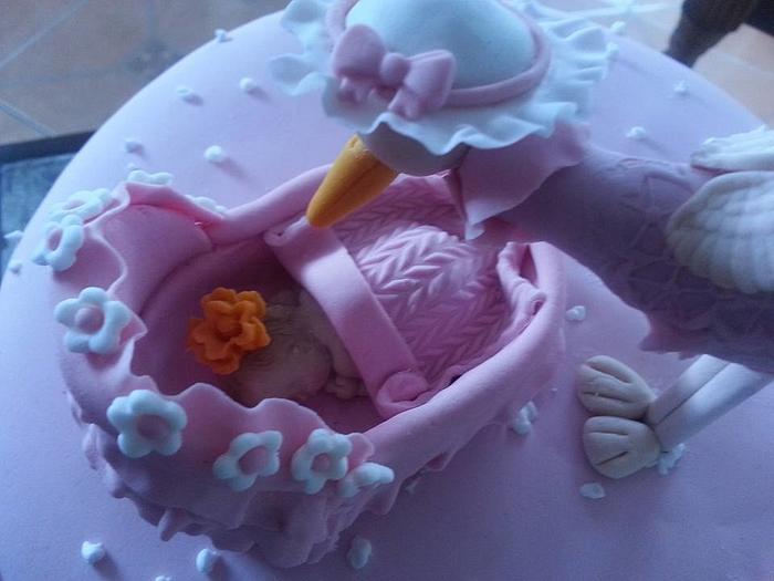 Baby and stork baby shower cake