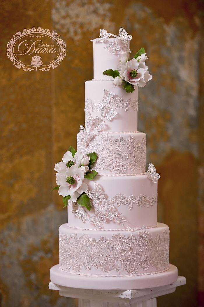 Sugar lace and magnolia wedding cake