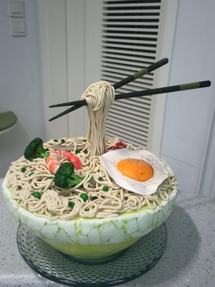 Gravity-defying bowl of noodles cake