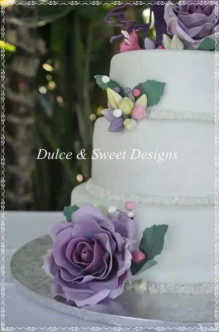 Purple rose wedding cake. 
